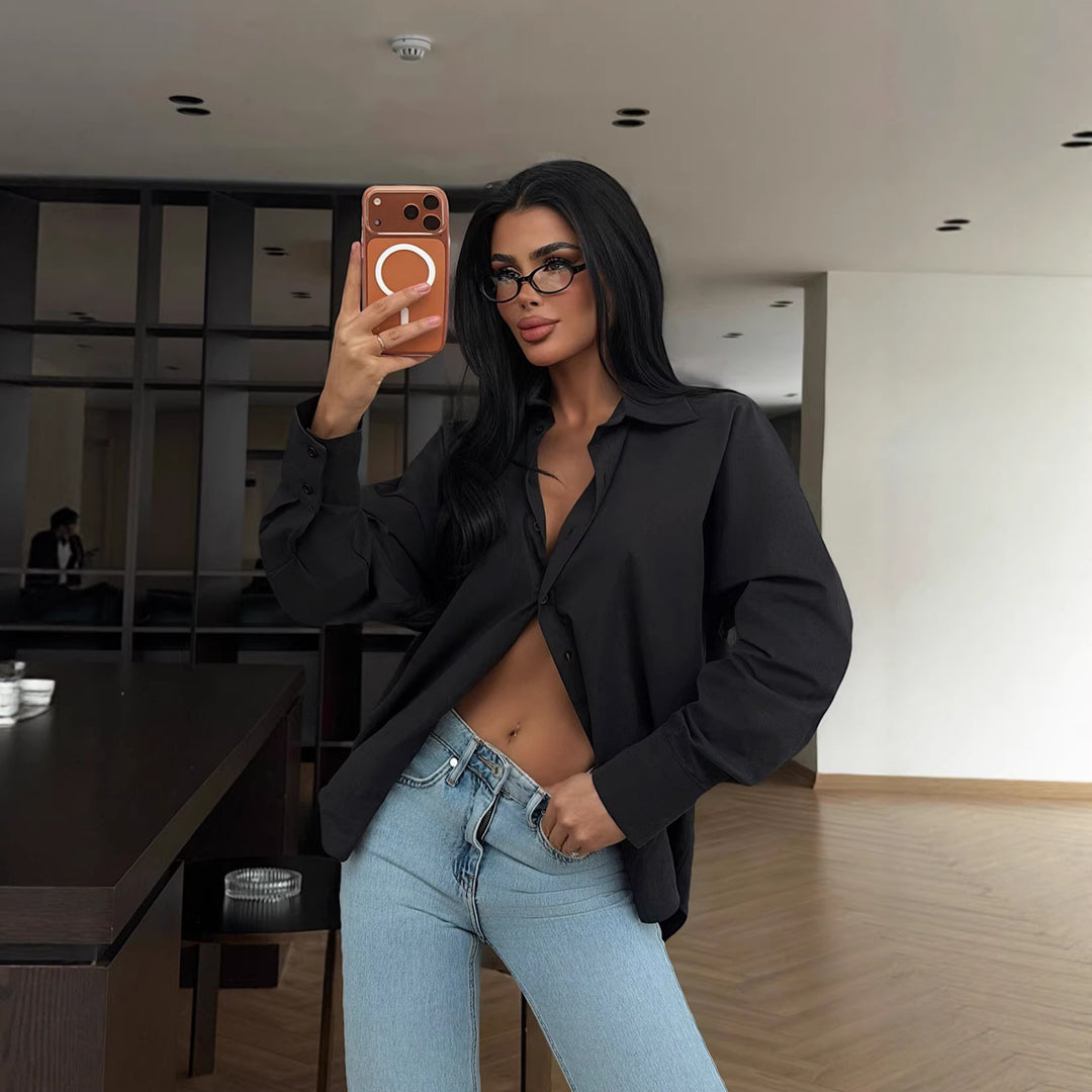 Damer elegant bluse med oversized snitt og knappbar design Skjora