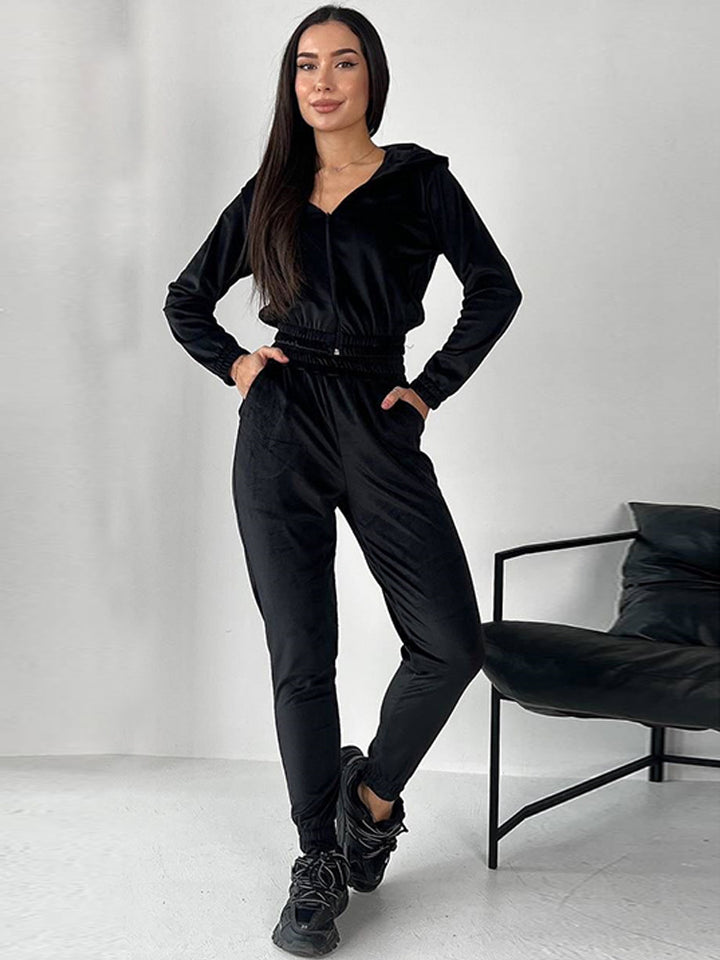 Kvinner's Velour Joggedrakt med Fasjonabel Kuttet Design og Praktisk Glidelås Skjora