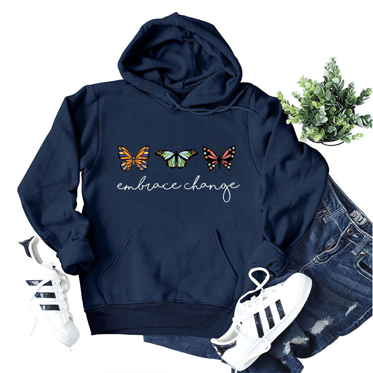 Dame hoodie med inspirerende sommerfuglmotiv og motiverende budskap Skjora