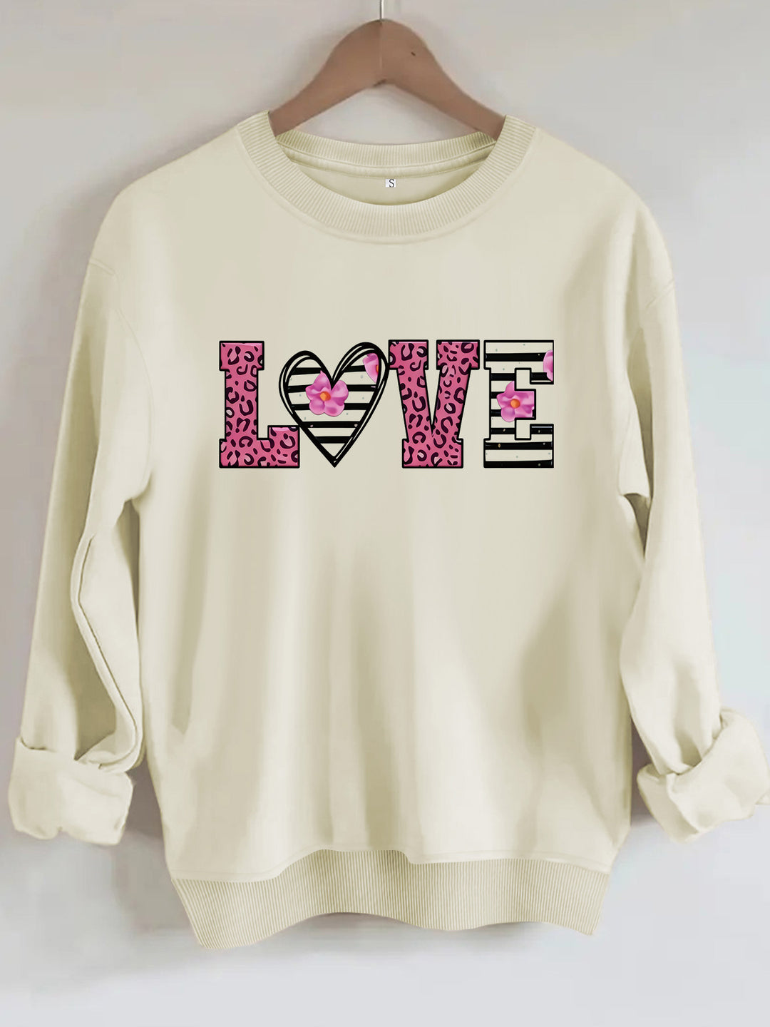 Dame sweatshirt med moderne leopard hjerte-design og behagelig passform Skjora