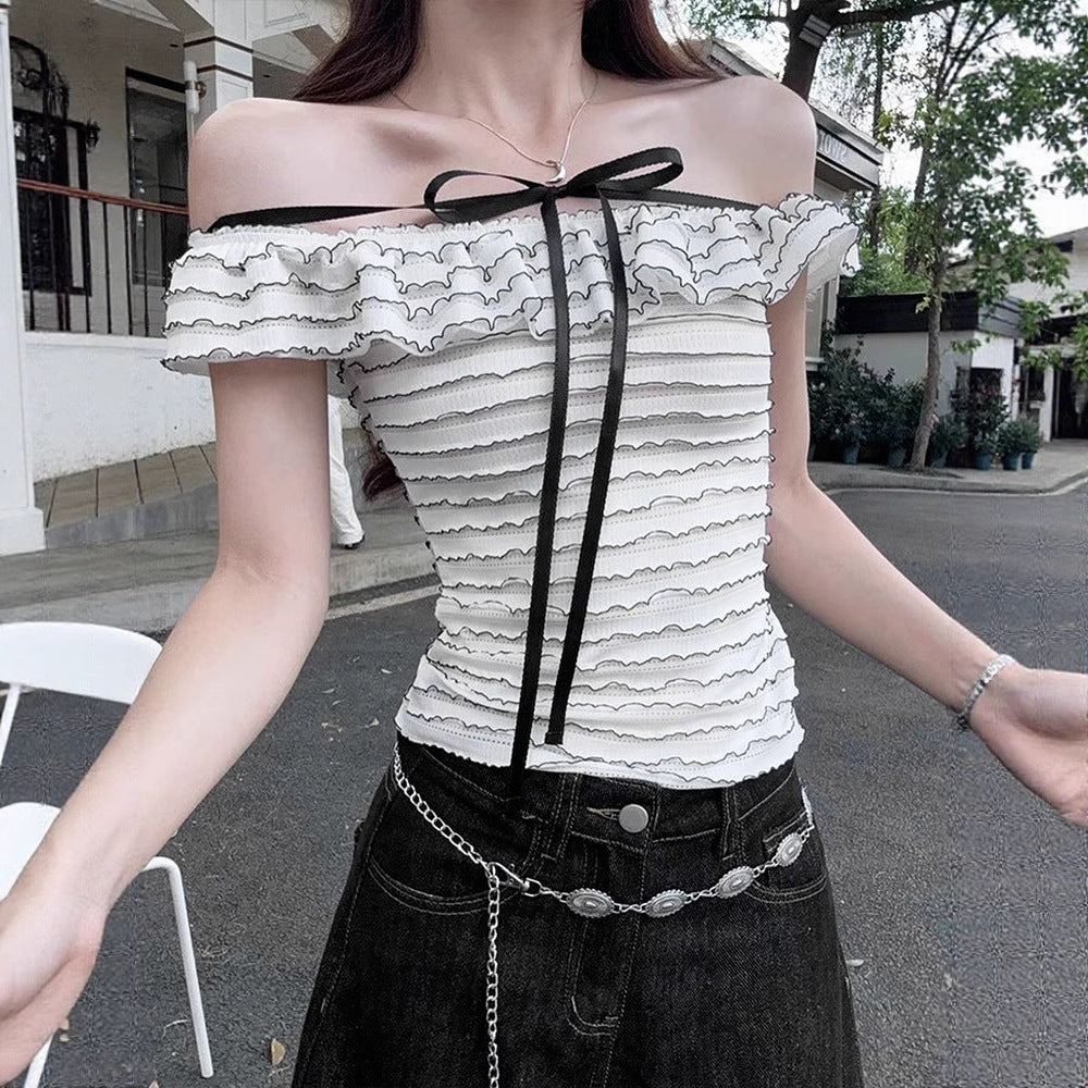 Dame Offshoulder-bluse med elegant bølgemønster Skjora