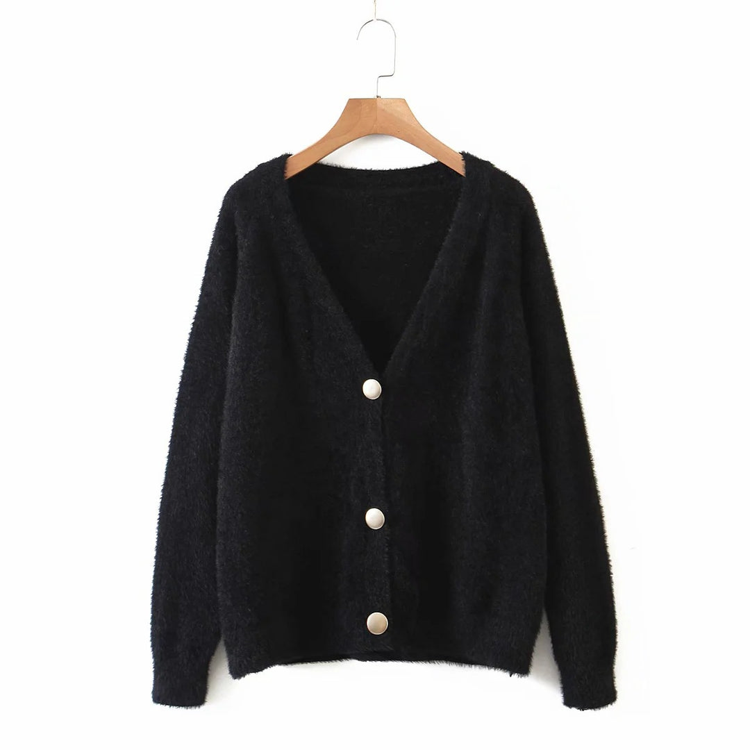 Kvinnens koselige cardigan med store knapper og oversized passform Skjora