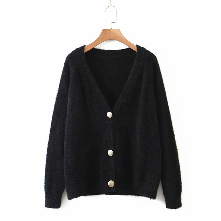 Kvinnens koselige cardigan med store knapper og oversized passform Skjora