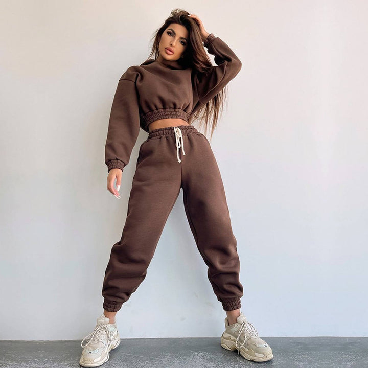 Kvinne sporty cropped treningsdrakt med høy krage og elastisk midje Skjora