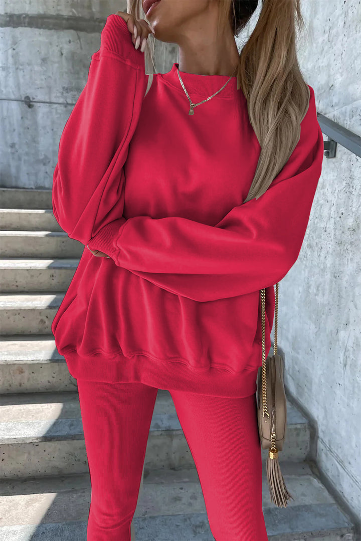 Damesporty fritidssett med casual oversized genser og tettsittende tights Skjora