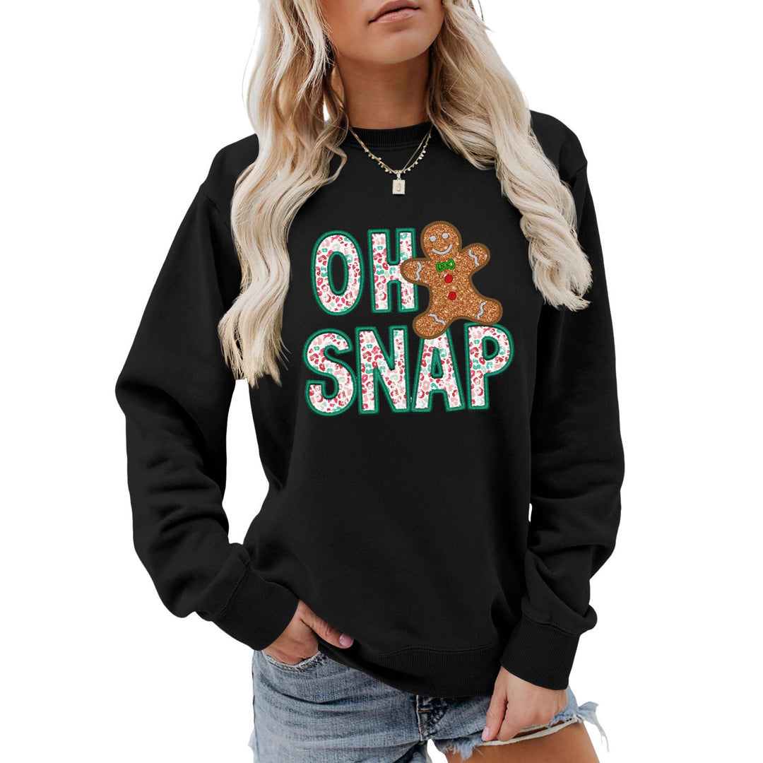 Dame sweatshirt med morsomt pepperkakemannmotiv og glitrende bokstaver Skjora