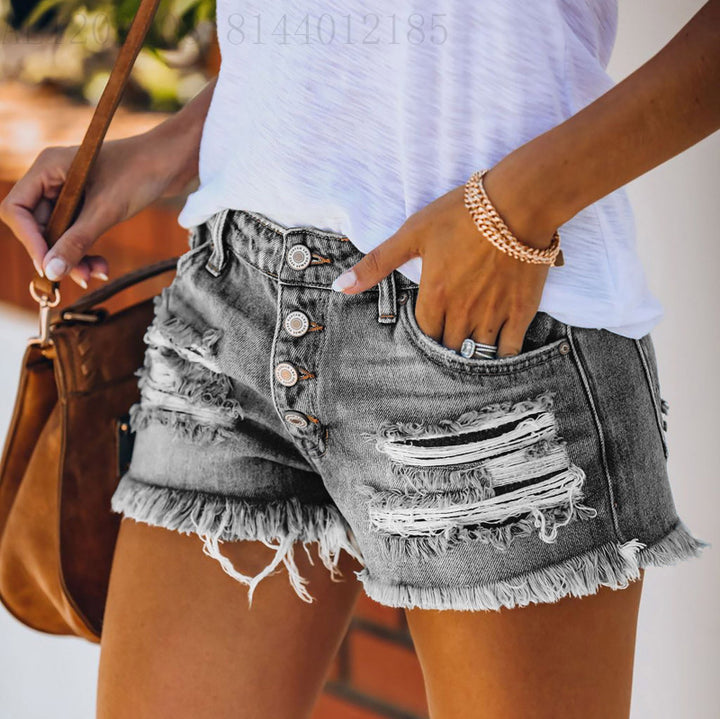 Dame casual ødelagte denimshorts med knappedetaljer og frynset kant Skjora