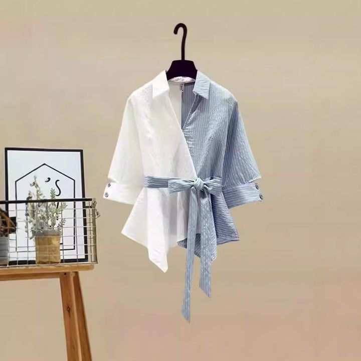 Dame To-delt Sett med løstsittende, stripete topp og vide jeans-bukser Skjora
