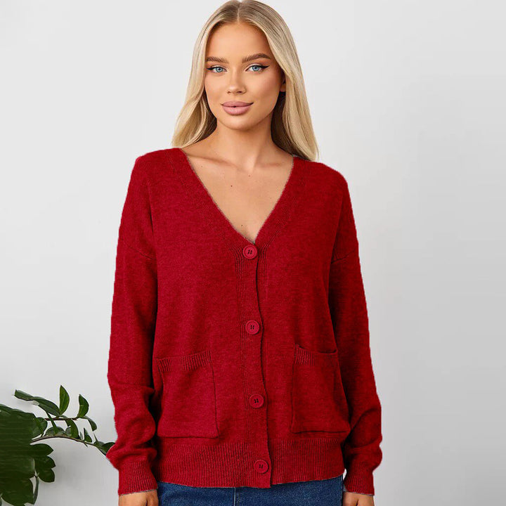 Kvinnens chunky strikket cardigan med dyp V-hals og praktiske lommer Skjora