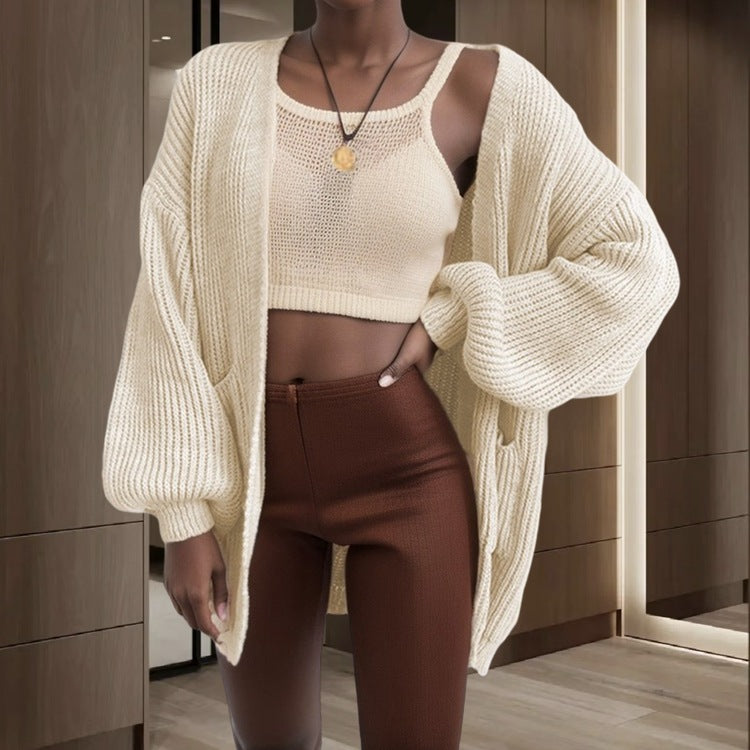 Damer chunky strikket cardigan med voluminøse ermer og praktiske lommer Skjora
