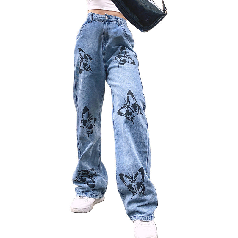 Dame vide jeans med iøynefallende sommerfugltrykk Skjora