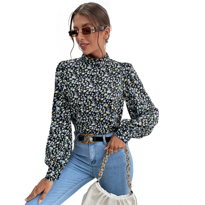 Kvinnes bluse med høy krage og voluminøse ermer Skjora