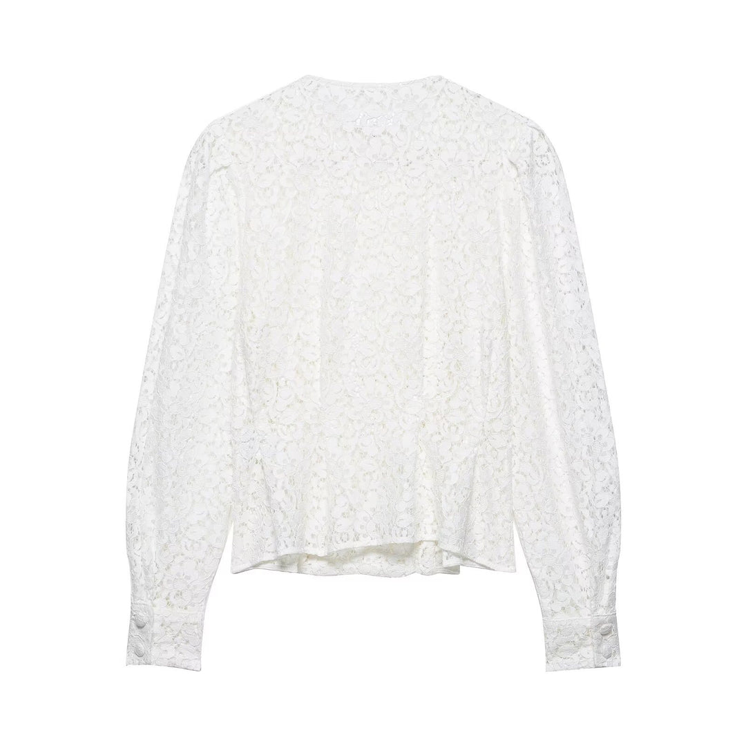 Dame spissbluse med dekorative knapper og elegant passform Skjora