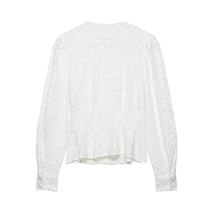 Dame spissbluse med dekorative knapper og elegant passform Skjora