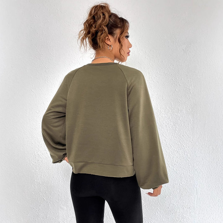 Dames uformell raglan sweatshirt med elastiske mansjetter og minimalistisk design Skjora