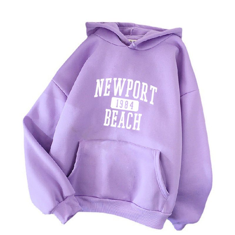 Damer hettegensere med nostalgisk Newport Beach trykk Skjora