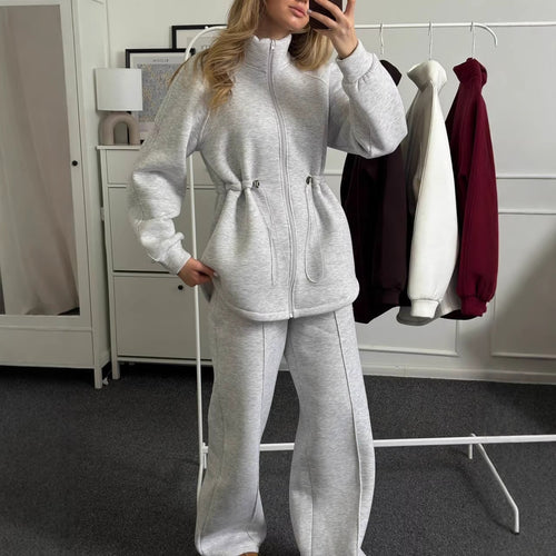 Kvinne fleece sportsdrakt med innovativ snor design og høy krage