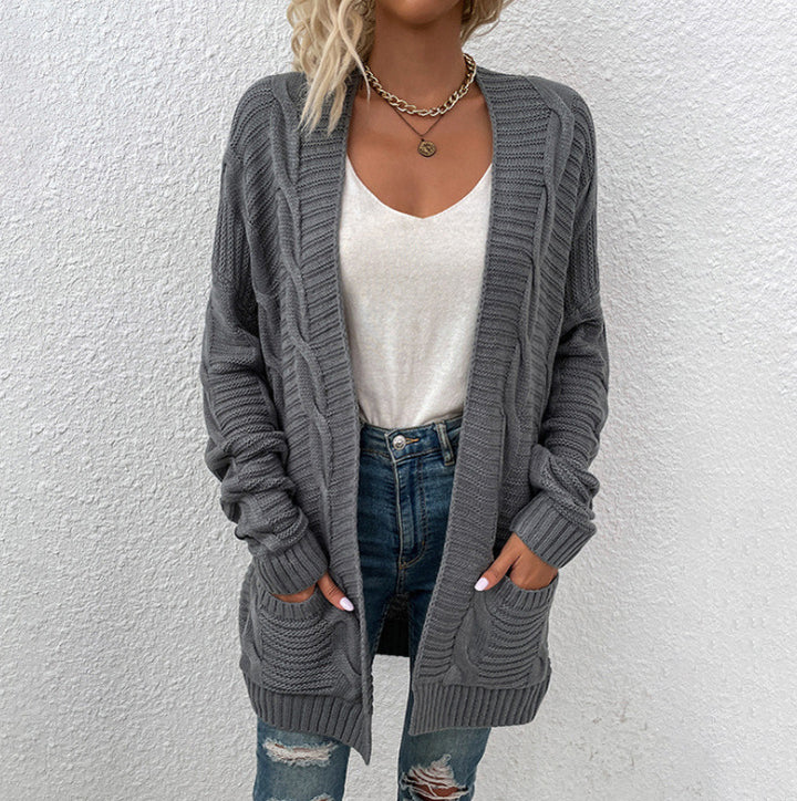 Kvinne chunky strikk cardigan med lommer og åpen frontdesign Skjora