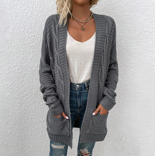 Kvinne chunky strikk cardigan med lommer og åpen frontdesign Skjora
