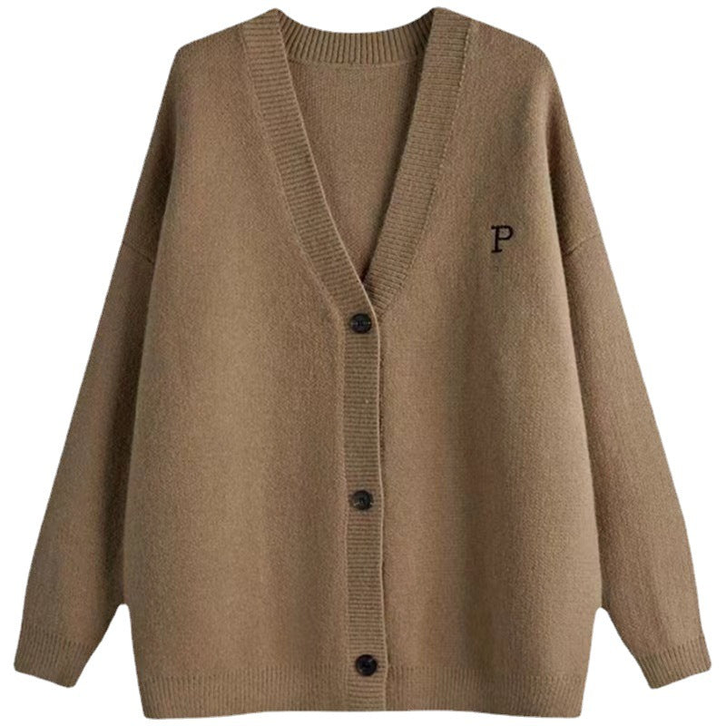 Kvinnens oversized cardigan med stilige krage og praktiske lommer Skjora