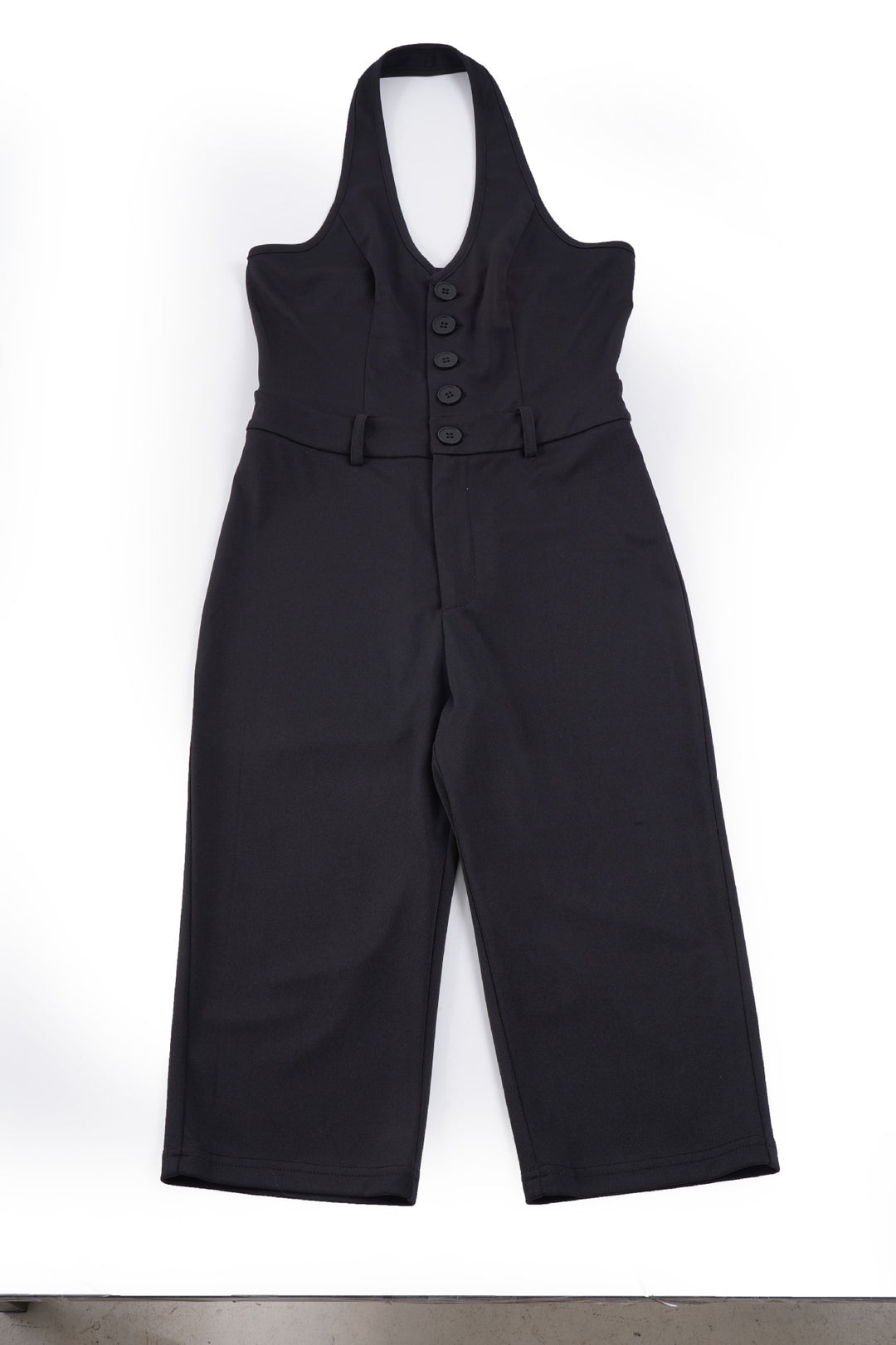 Dame jumpsuit med dyp V-hals og elegant knappdetalj Skjora