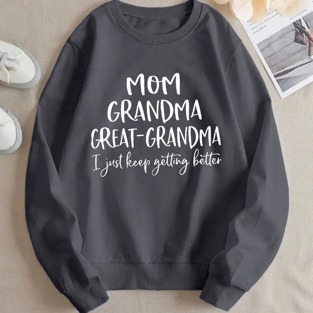 Dame sweatshirt med kreativ familieprint og komfortabel passform Skjora