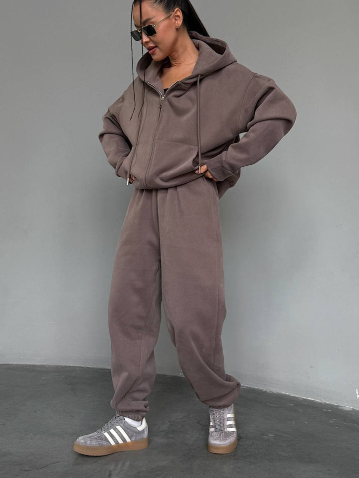 Kvinnekoselig hettegenser jumpsuit med høy kvalitets glidelås og avslappet passform