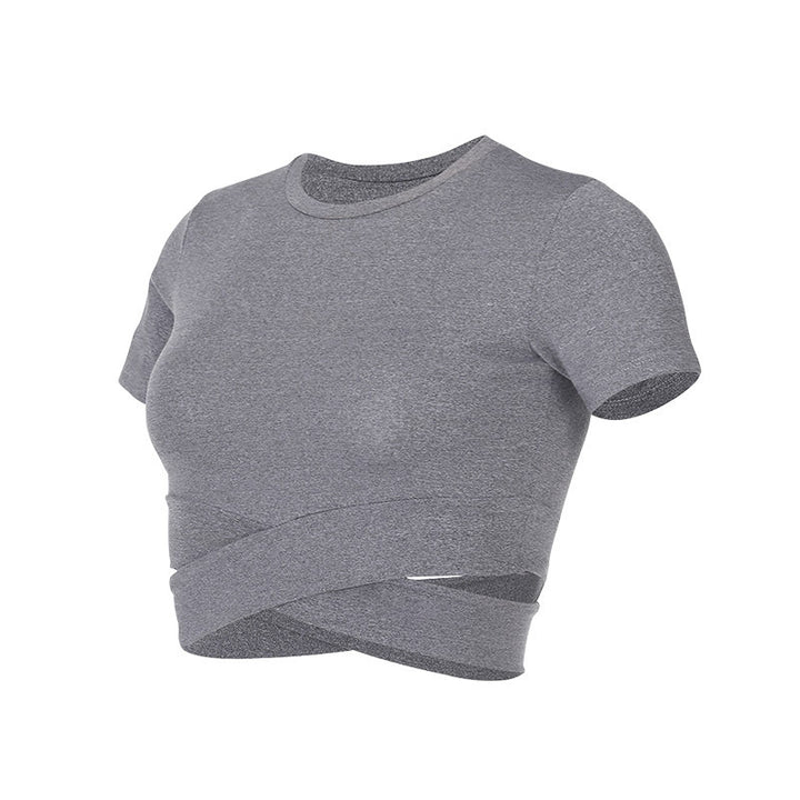 Dame kortermet trenings-crop-top med innovativt draperingsutseende Skjora