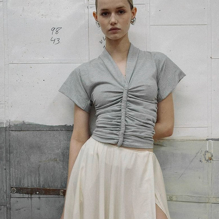 Damer elegant kortermet topp med figurformende ruffling Skjora