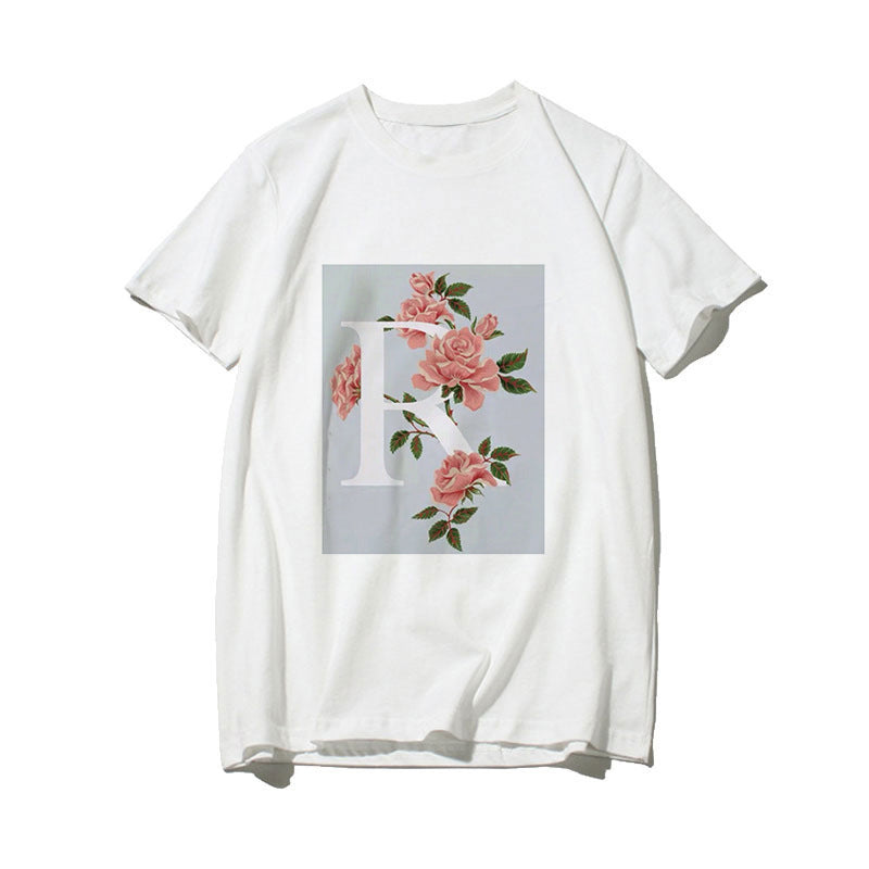 Dame T-skjorte med blomsterdesign og kreativt trykk Skjora