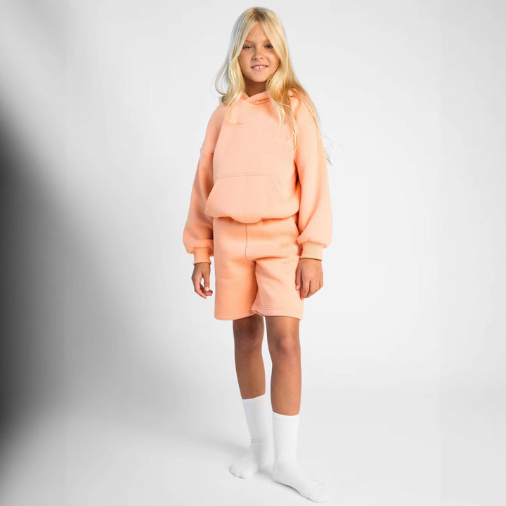 Kvinnenes avslappede hettegenser og shorts-sett laget av mykt materiale med praktiske lommer Skjora