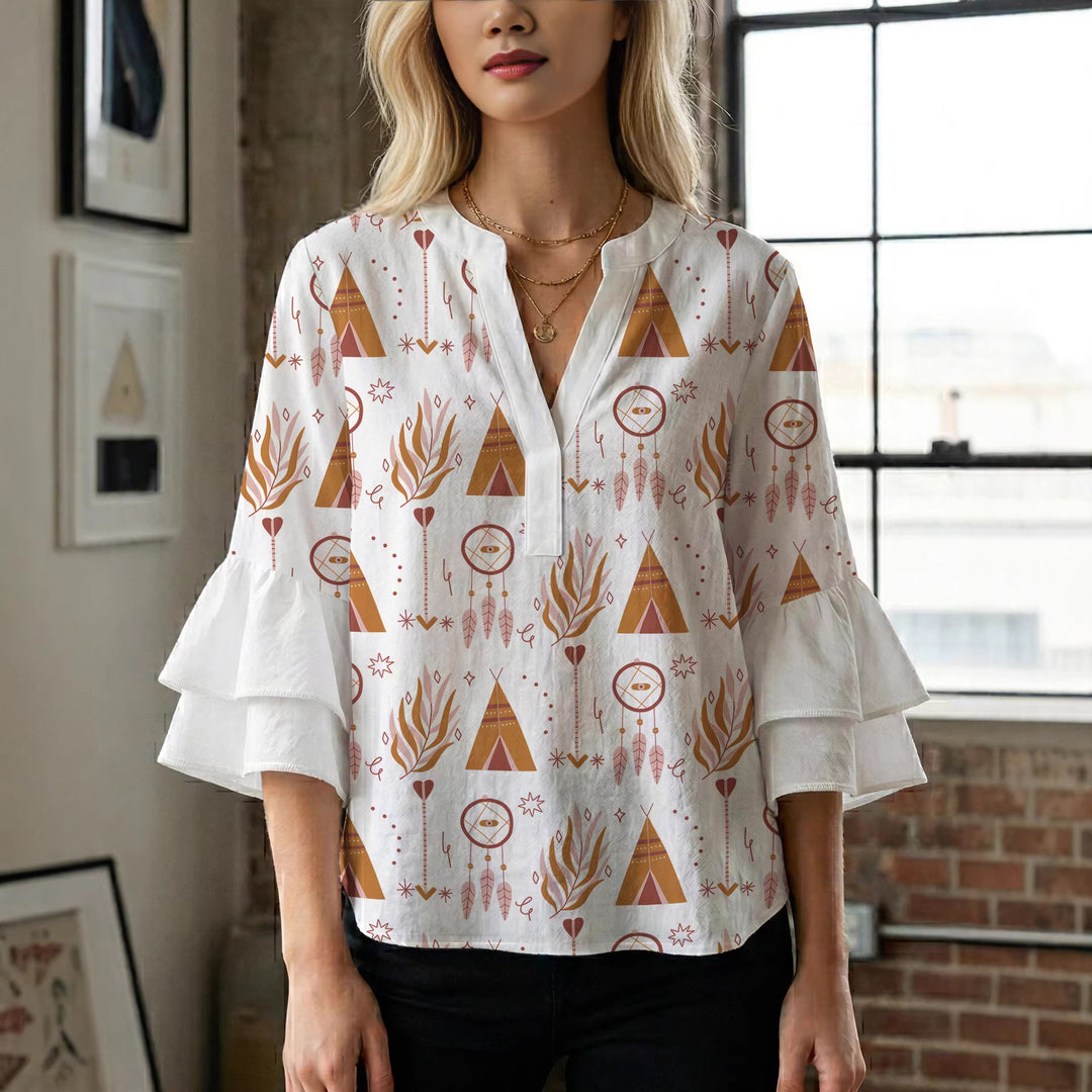 Dame bluse med voluminøse rysjermer og moderne motiv Skjora