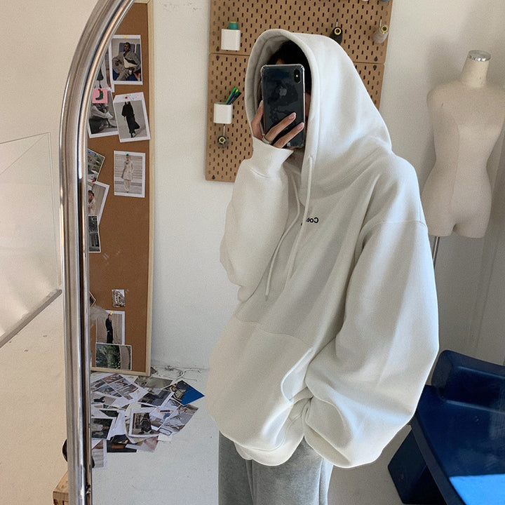 Damegenser med en avslappet fasong og praktisk kengurulomme-design