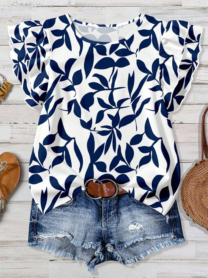 Damebluse med pufferm og blomsterdesign Skjora