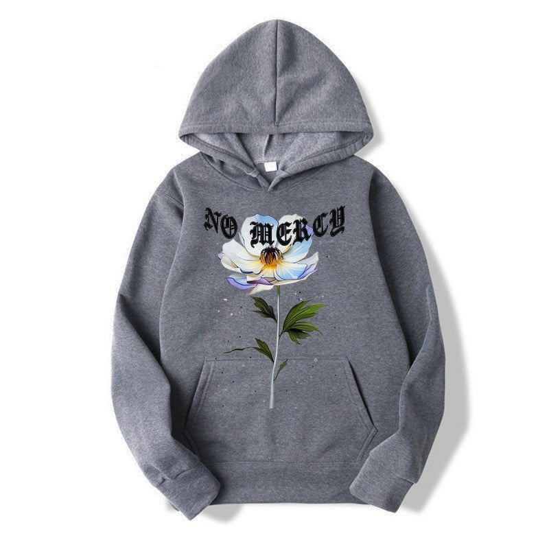 Damegenser med blomsterprint og fremtredende tekst Skjora