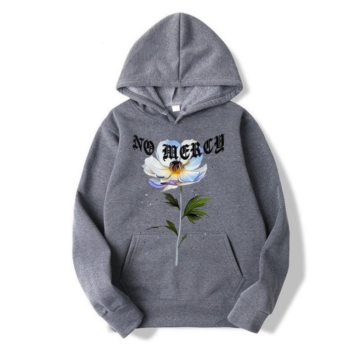 Damegenser med blomsterprint og fremtredende tekst Skjora