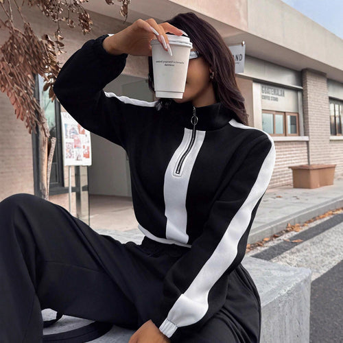 Dame sporty loungewear-set med halv glidelås og elegante kontraststriper Skjora