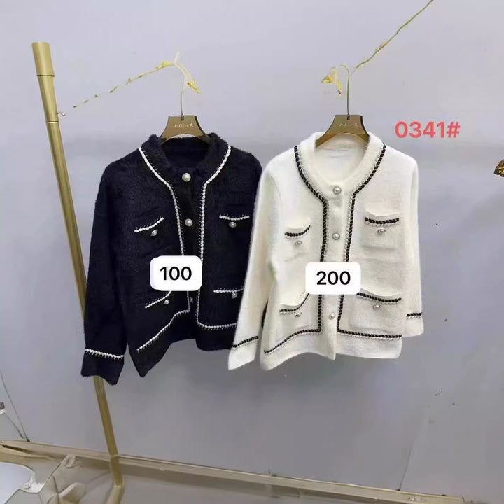Kvinnenes elegante cardigan med kontrastdetaljer og lommer Skjora
