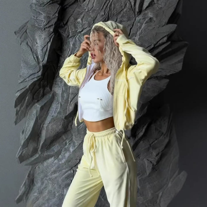 Dame fleece treningsdrakt med høy krage og elegant glidelås