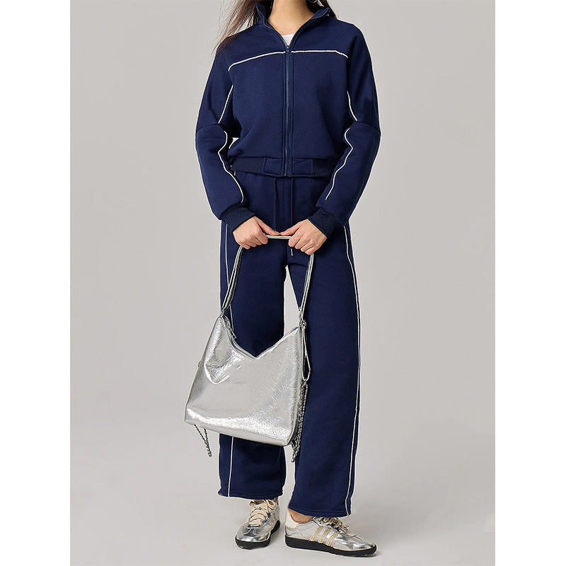 Kvinnelig sporty fritidssuit med høy krage og elastisk linning Skjora
