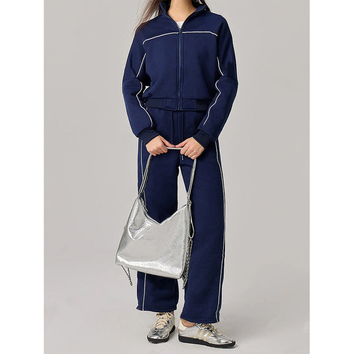 Kvinnelig sporty fritidssuit med høy krage og elastisk linning Skjora