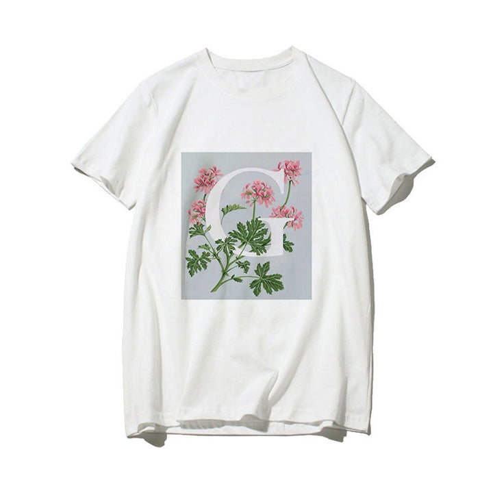 Dame T-skjorte med blomsterdesign og kreativt trykk Skjora