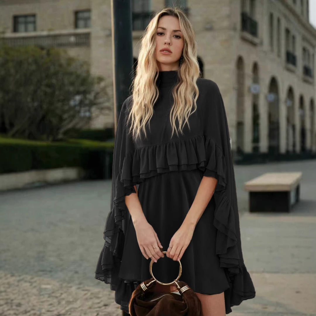 Dame Elegant rynkedress med høy hals og flytende snitt Skjora