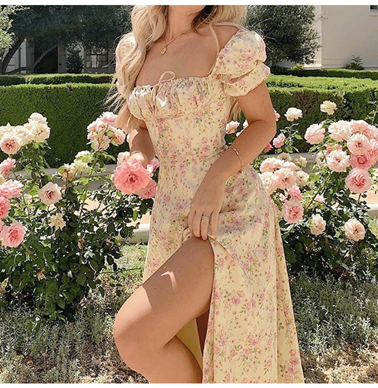 Kvinnenes romantiske maxi kjole med elastiske puffermer og delikat blomstertrykk Skjora
