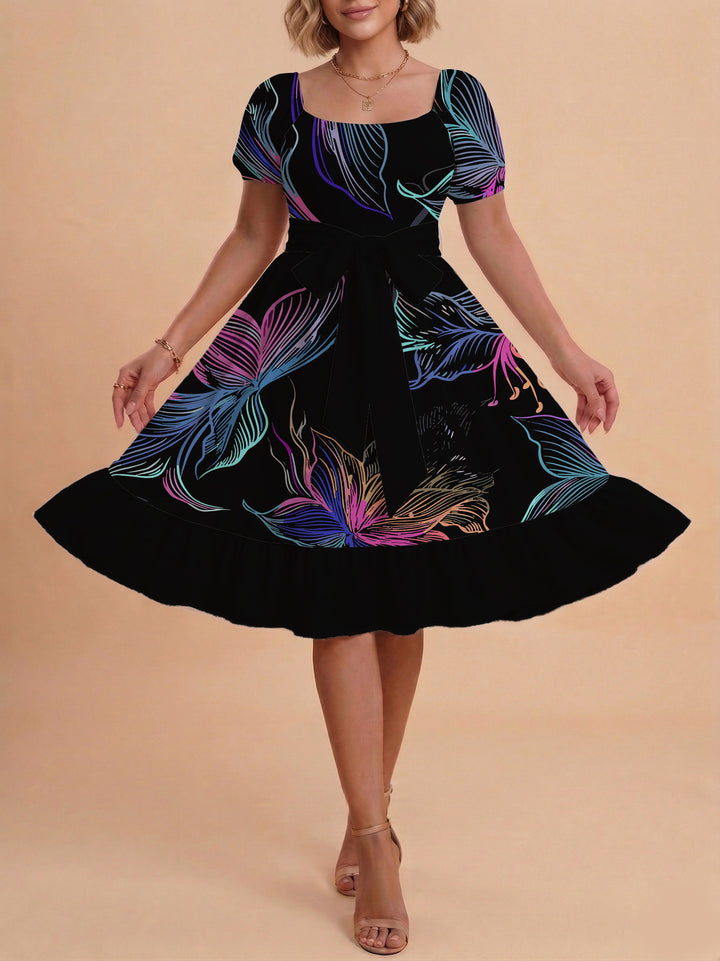 Damen modernes Blumenkleid mit elegantem Taillengürtel und asymmetrischem Saum Skjora