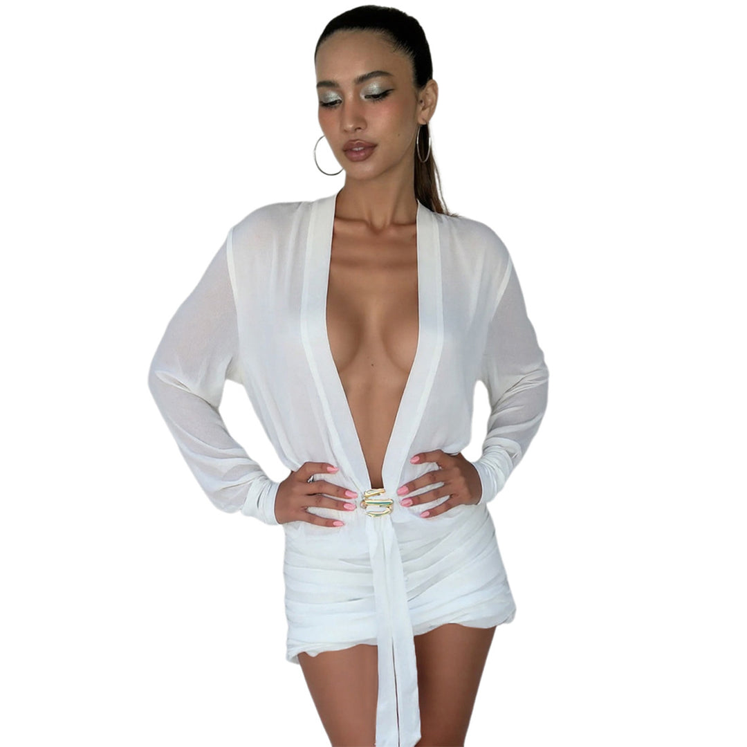 Dame innpakningsbluse med elegant drapering og fargerik brochelukking Skjora