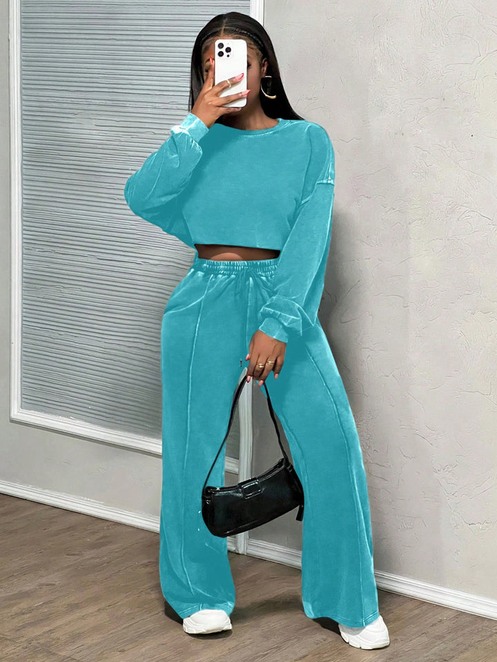 Kvinne kuttet loungewear-sett med vide bukser og høy midje Skjora