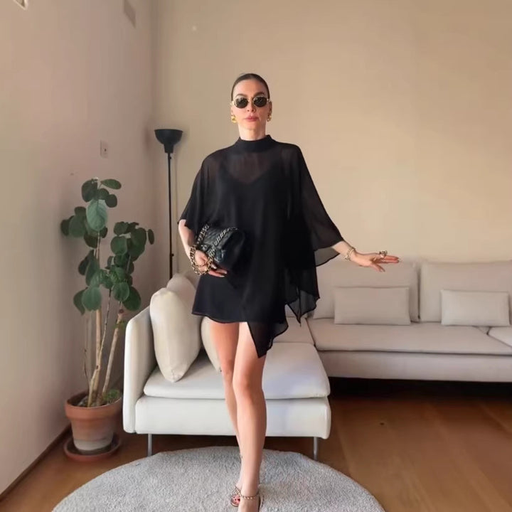 Kvinnelig elegant chiffon tunika med asymmetrisk snitt og flytende design Skjora
