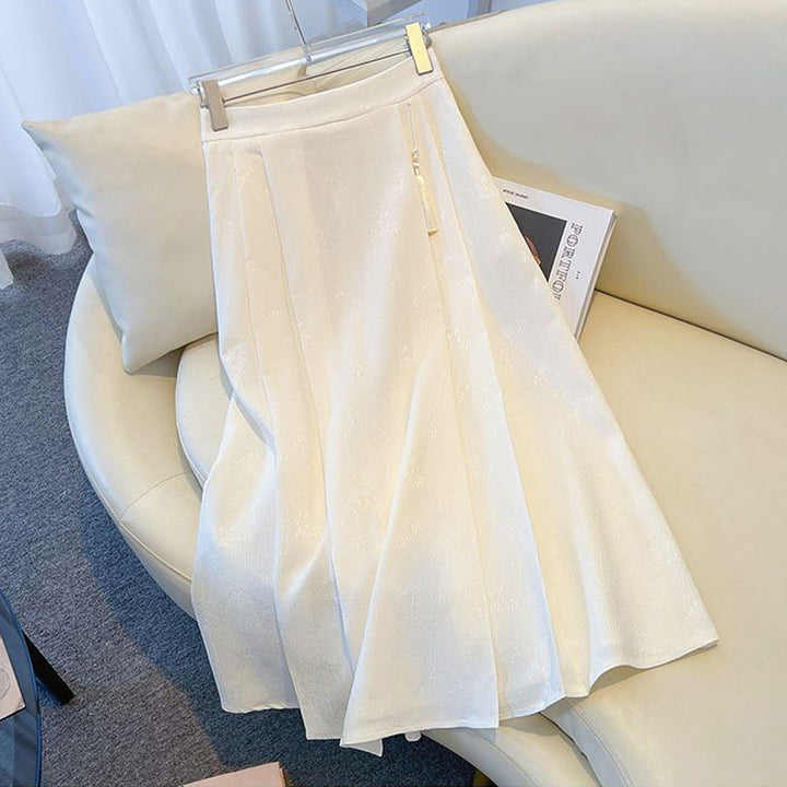 Damenes elegante midi skjørt med teksturert stoff og flytende snitt