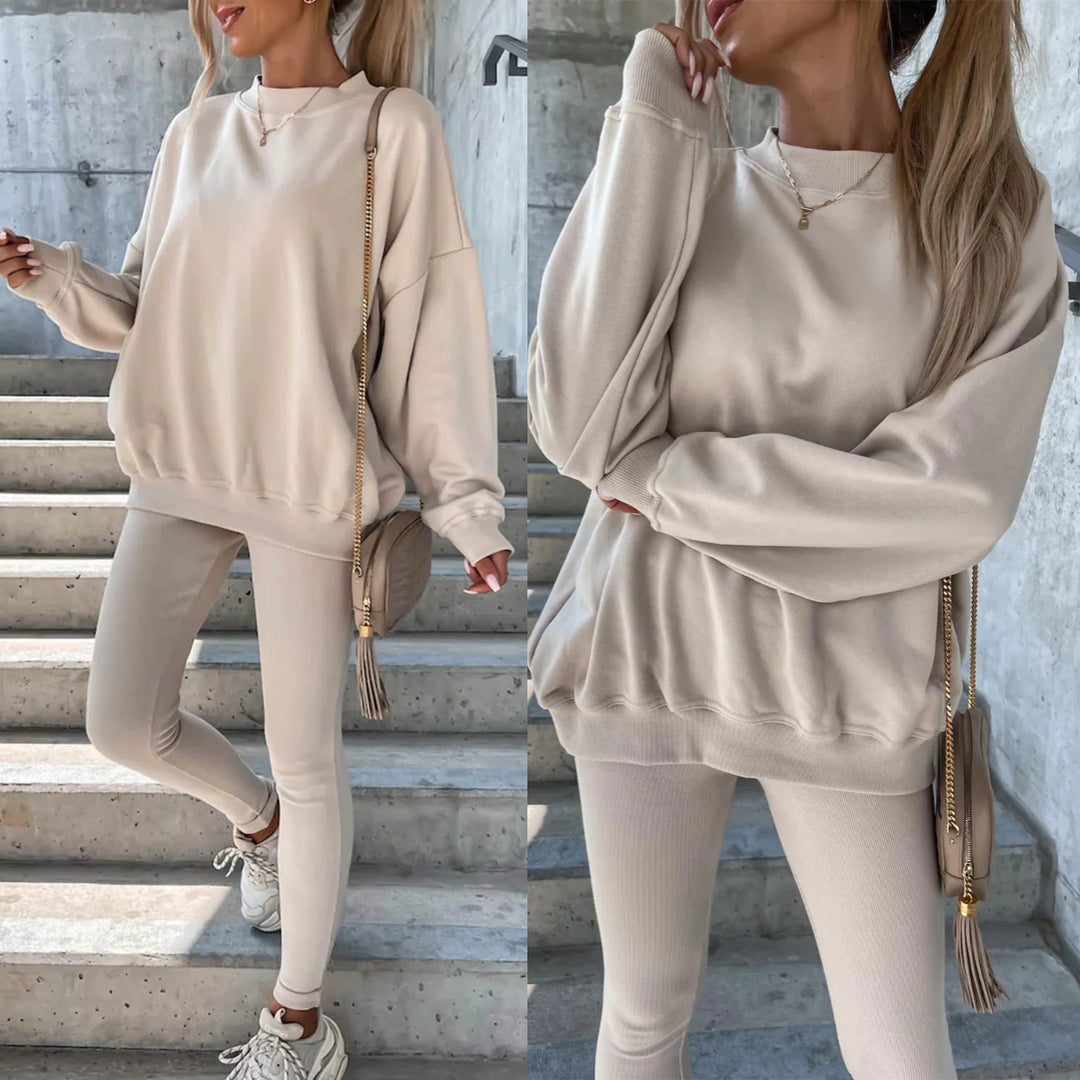 Damesporty fritidssett med casual oversized genser og tettsittende tights Skjora